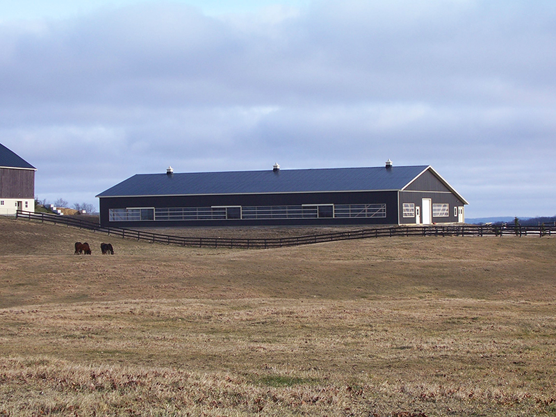horse riding arena, indoor horse riding arenas, building horse riding arena, we cover, dutchmasters, ironwood building systems, fabric covered horse riding arena, wood post frame horse riding arena, lindsay day remt, steel frame horse riding arena, pre-engineered horse riding arenas, pre-built horse riding arenas, horse arena footing, pdi lasergrade, horse riding arena permit