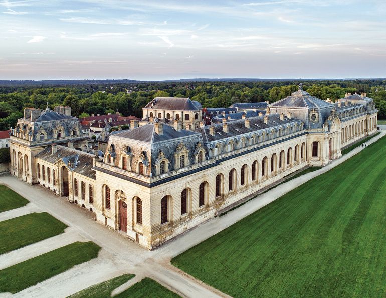 Chantilly great stables france,  Grandes Ecuries Chantilly, France, museums for horse people, chateau de chantilly, living museum of the horse, louis-henri de bourbon-conde museum, compagnie equestre du chateau de chantilly schooling ring, sophie bienaime living museum of horse
